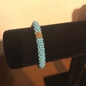 Blue and gold infinity bracelet